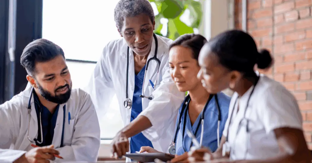 doctors talking at a table