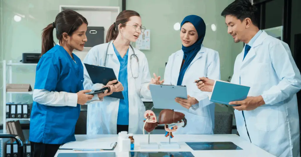 group of medical professionals discussing at a table