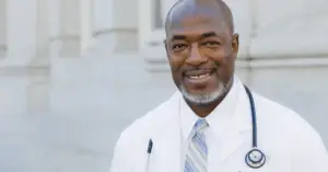 physician smiling at camera