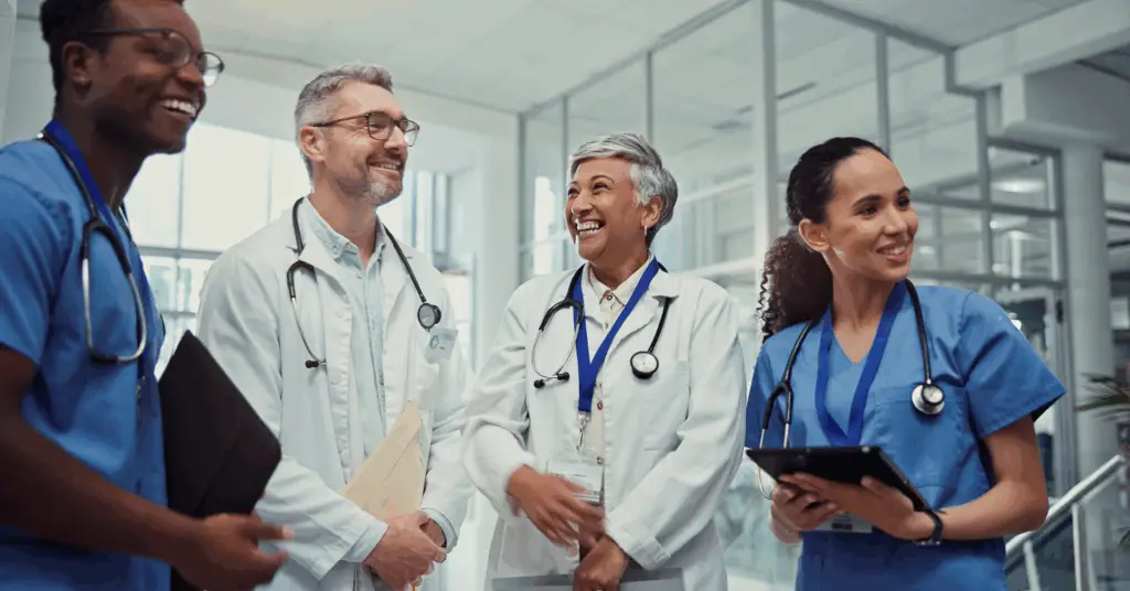 medical or tablet with doctors and nurses in hospital together for collaboration