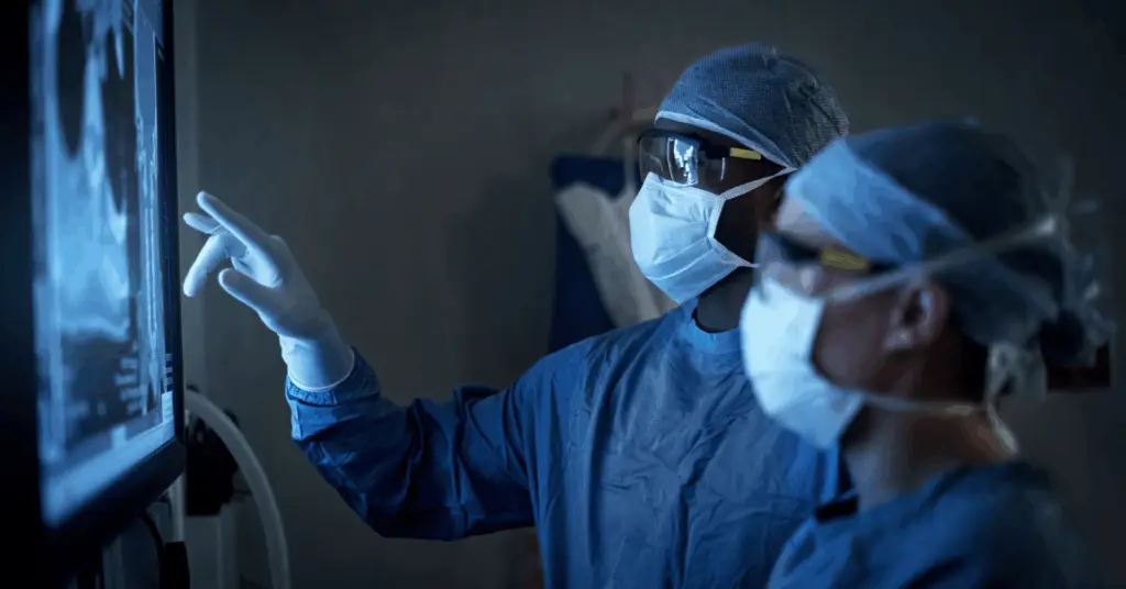 two surgeons viewing xrays in hospital