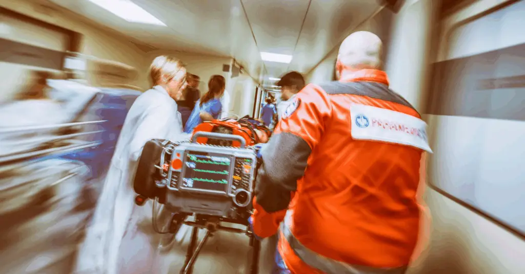 patient being rushed in emergency room