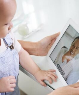 Medical professional conducting a telemedicine appointment with a young patient.