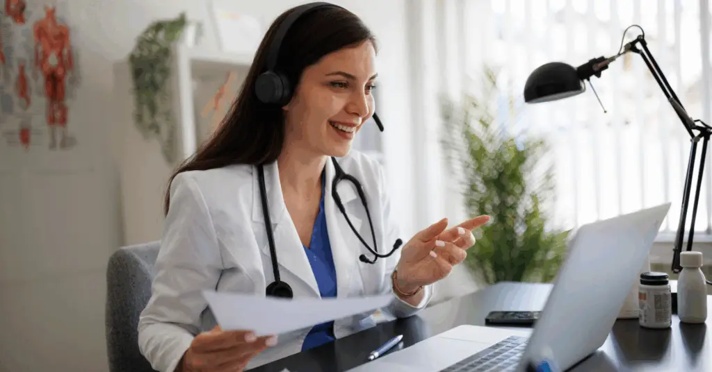 female doctor talking to patient on the computer-telehealth