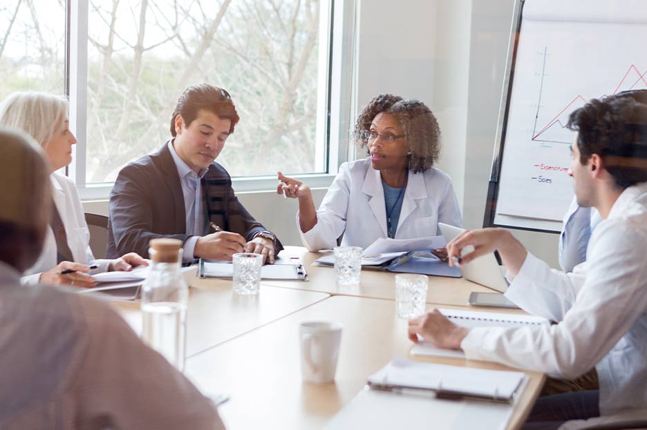 Group of medical professionals in a meeting.