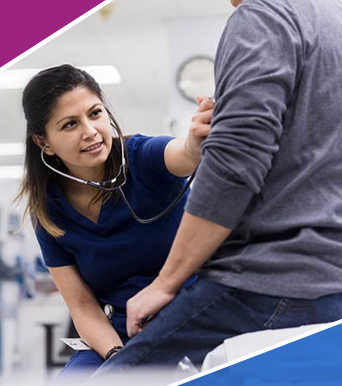 Nurse using a Stethoscope on a patient to prep for emergency medicine.