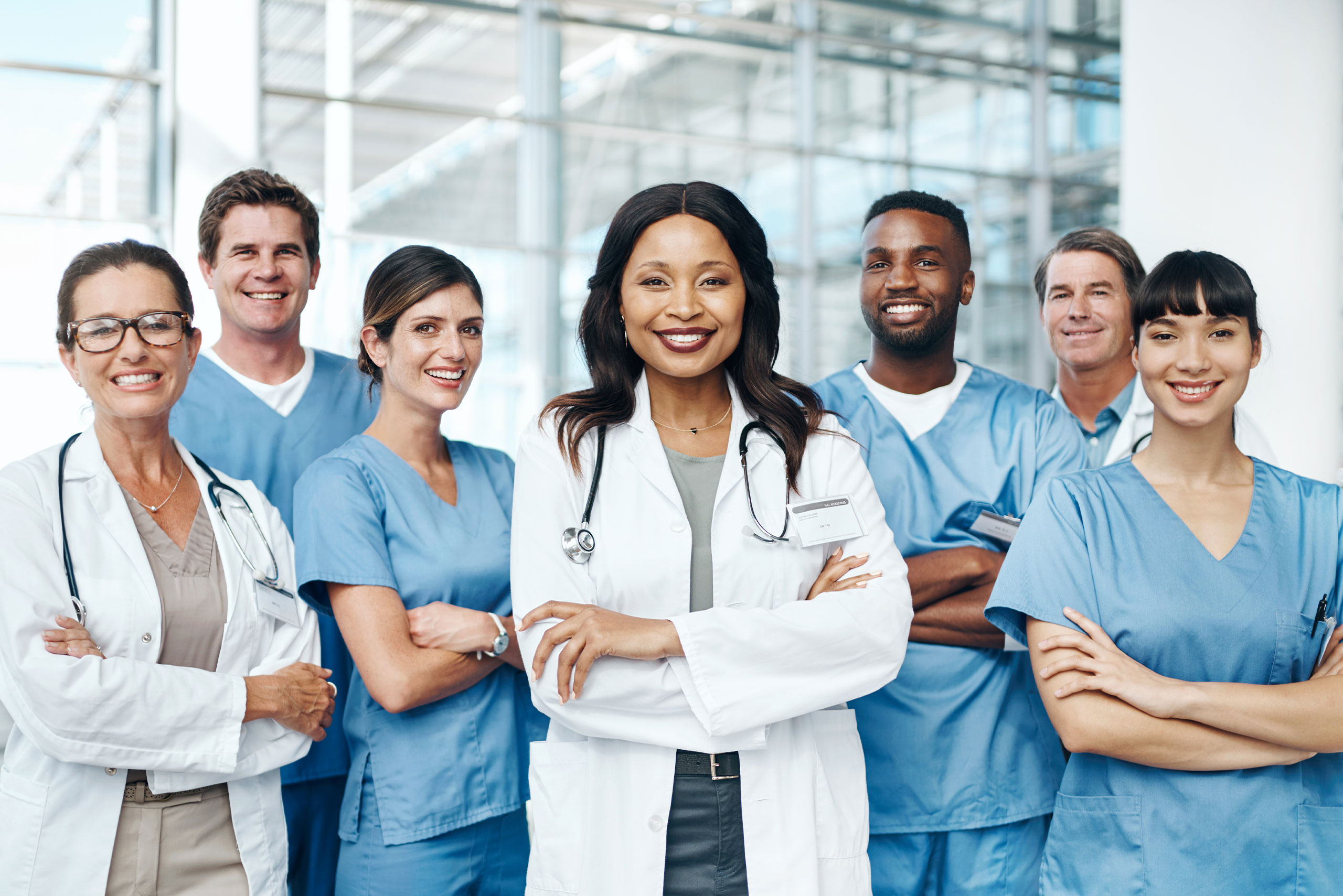 A group of diverse doctors and nurses partnering together.