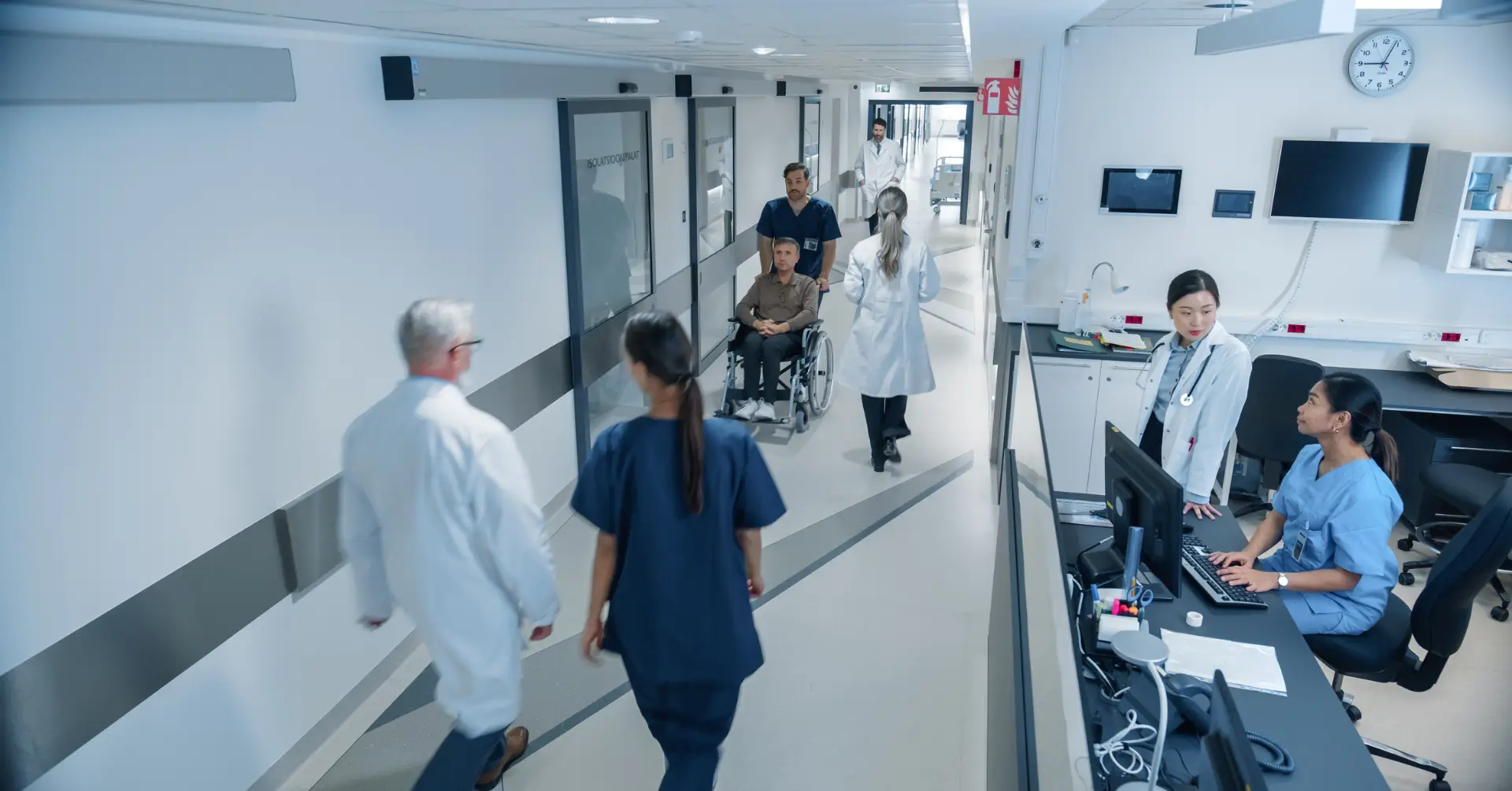medical professionals walking the halls of a hospital