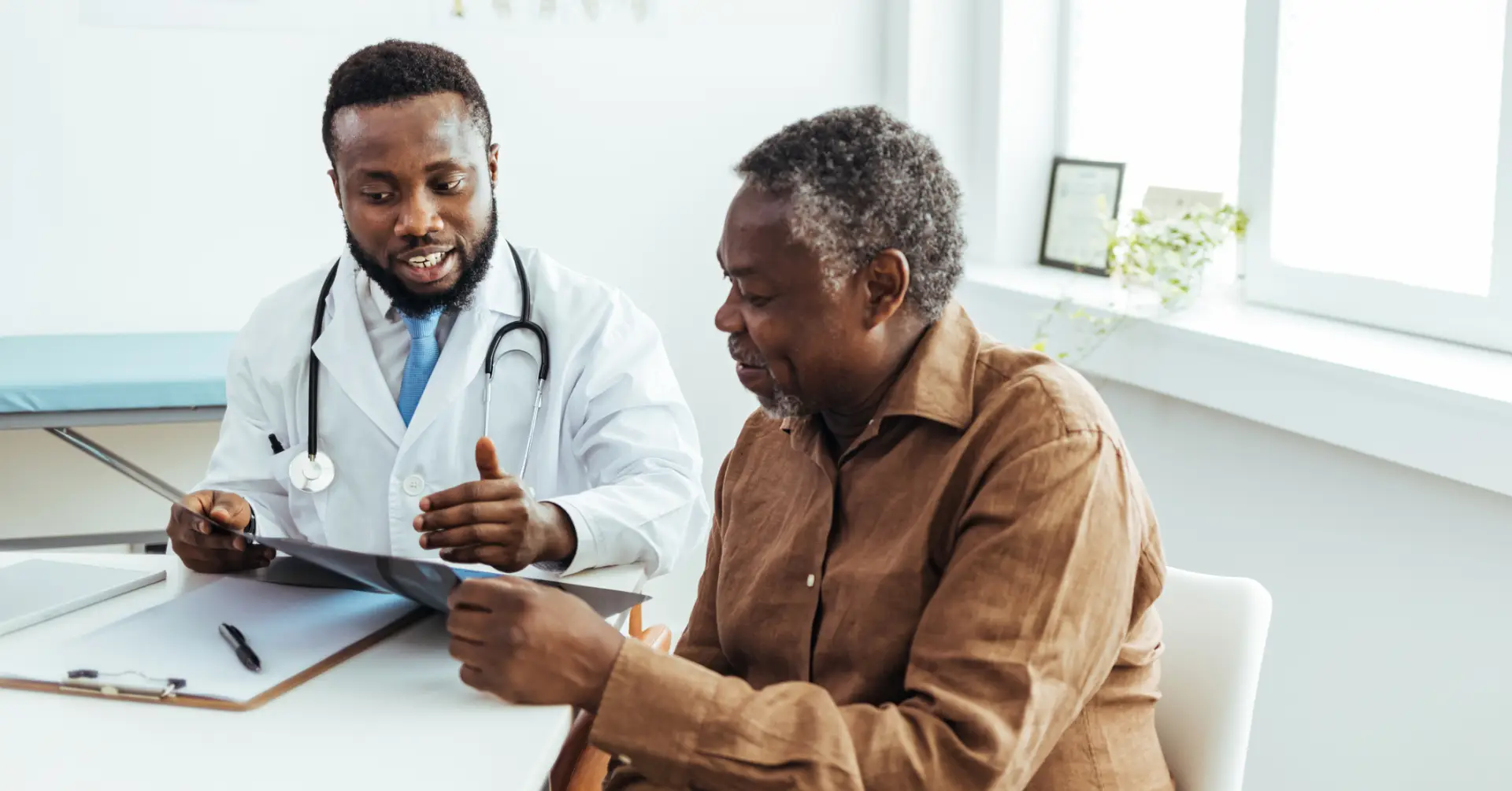 doctor speaking to patient about care