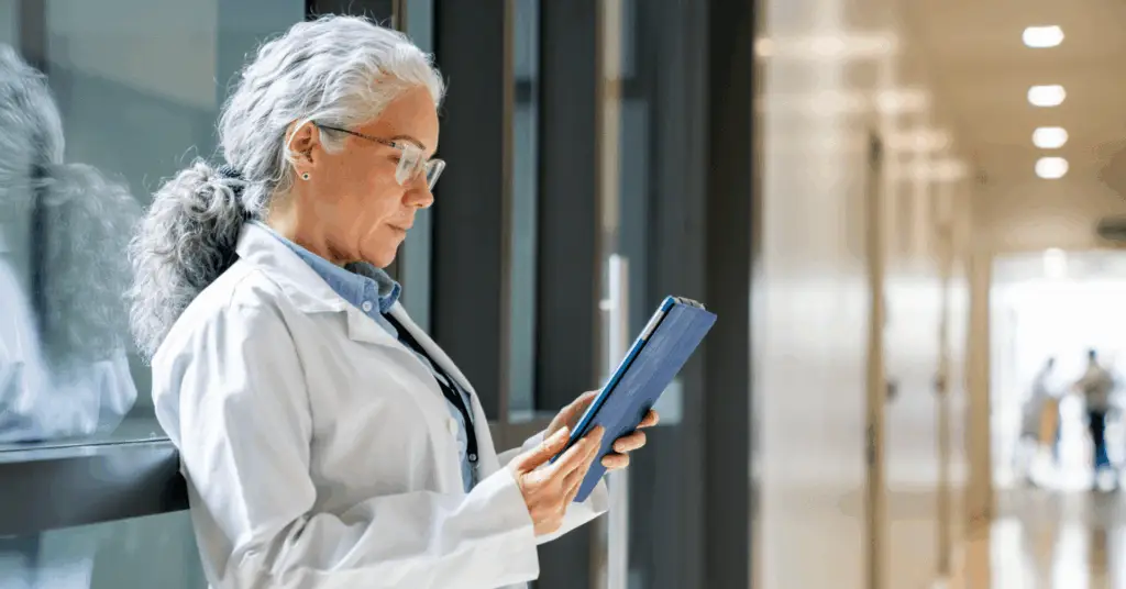 female doctor looking at a tablet