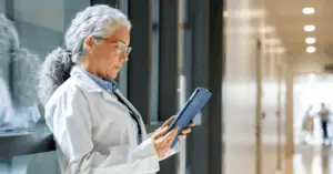 female doctor looking at a tablet