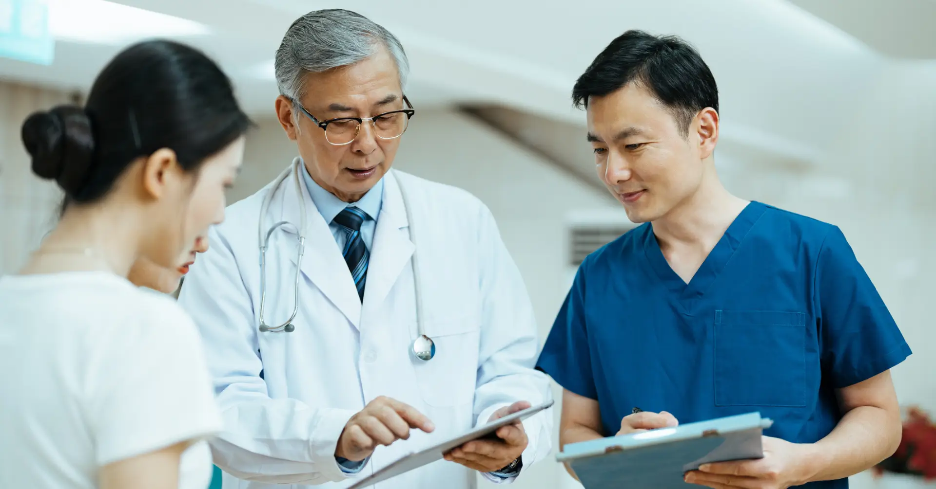 physician discussing chart with patient
