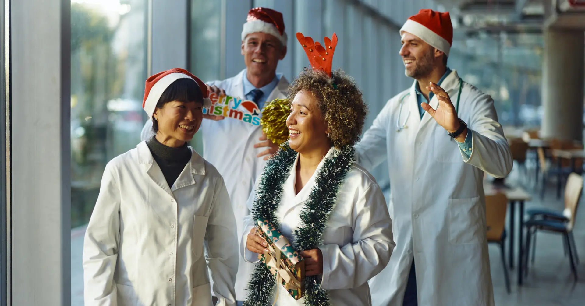 group of doctors celebrating the holidays in festive attire